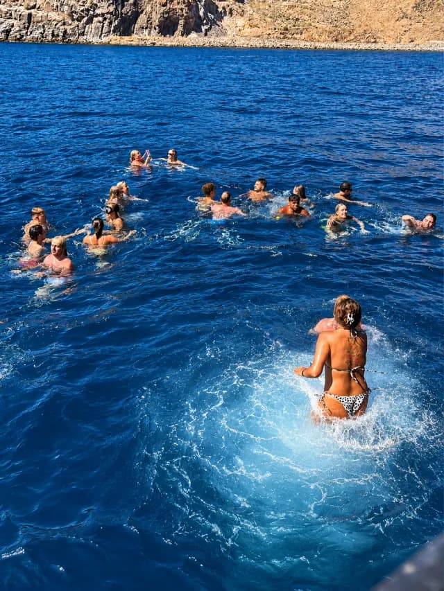 Guests jumping into the Atlantic
